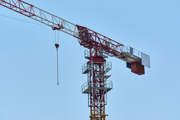 Industrial tower crane for civil construction and urban infrastructure development.