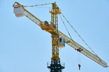 Naklejka premium Industrial tower crane for civil construction and urban infrastructure development.