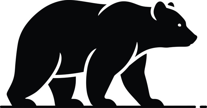 Black bear silhouette walking on ground