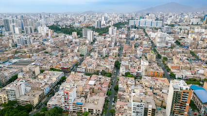 Panoramic aerial view of Lima city with Jes&uacute;s Mar&iacute;a district and Rebagliati hospital in the background.