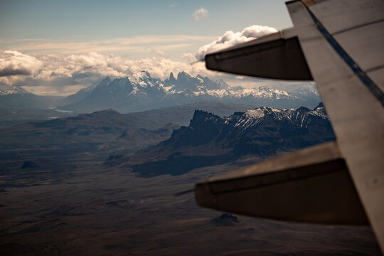 Aerial views of Fitz Roy, a mountain in the Andes on the border of Argentina and Chile while landing in Calafate,