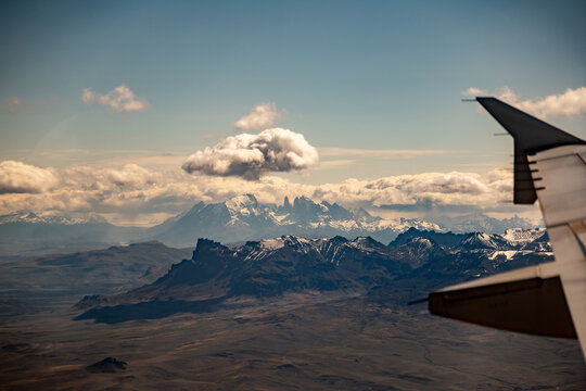 Aerial views of Fitz Roy, a mountain in the Andes on the border of Argentina and Chile while landing in Calafate,