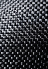 High Detailed Close-up of Black Carbon Fiber Weave Texture Background