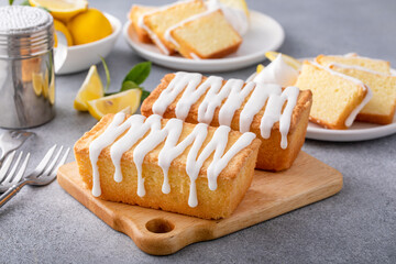 Lemon pound cake drizzled with powder sugar frosting
