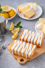 Lemon pound cake drizzled with powder sugar frosting