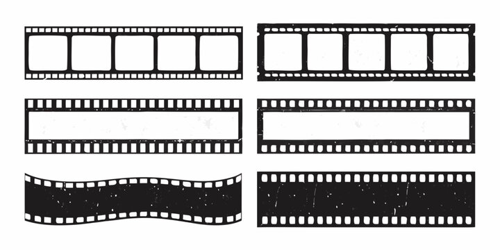 Collection of vintage filmstrips with sprocket holes isolated on white
