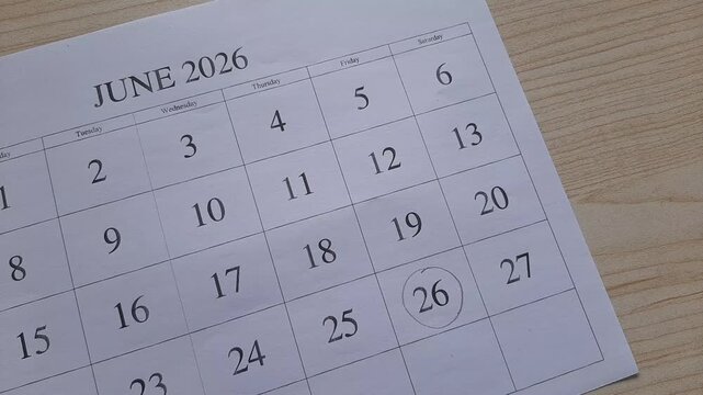 marking 26 June 2026 date on the calendar
