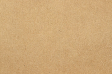 Fototapeta premium Brown cardboard sheet abstract background, texture of sepia color kraft paper with vintage pattern for design art work.
