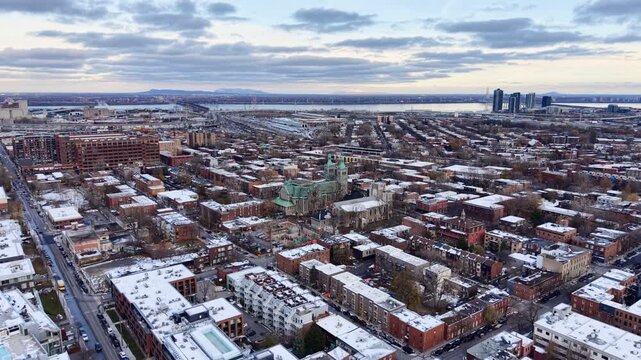 defaultAerial view of Griffintown Montreal and Lachine Canal with winter cityscape and river at daytime. g.