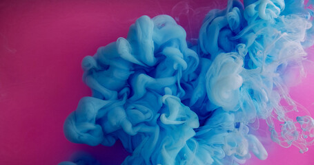 Fototapeta premium Paint fume splash. Underwater mix mist. Defocused blue pink purple color cloud glitter liquid smoke texture spreading on abstract background.