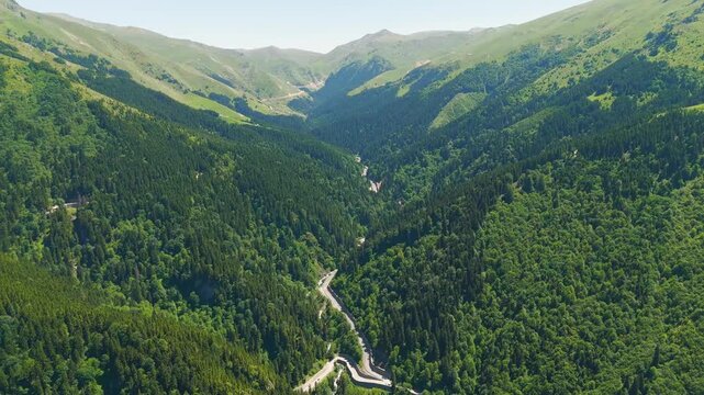 Altindere, Trabzon Province, Turkey. Altindere Valley Park. Panoramic views during the day. Flying through the valley. Coniferous forest on the slopes. Aerial View, Departure of the camera, Departure
