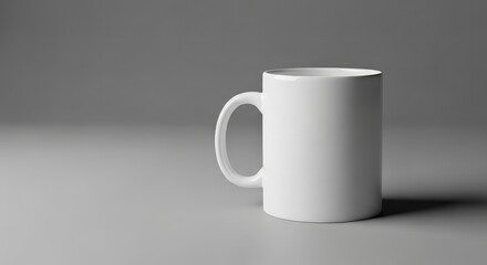 Obraz premium Premium Blank White Coffee Mug Product Mockup for Logo and Graphic Design on Neutral Studio Background with Copy Space 110char