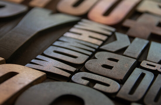 Wooden letterpress printing blocks in closeup
