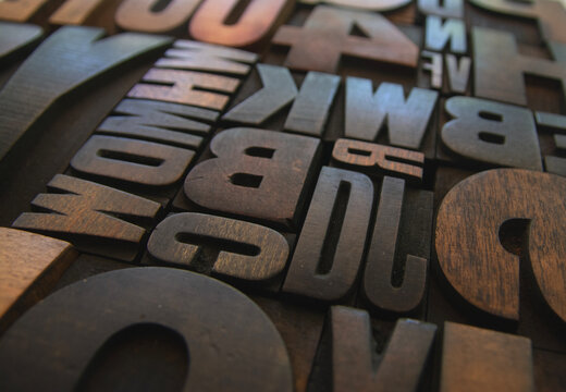 Wooden letterpress printing blocks in closeup