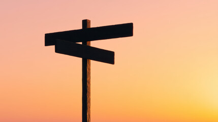 Blank road sign silhouette against vibrant sunset sky, symbolizing choices and directions. warm colors evoke sense of calm and contemplation