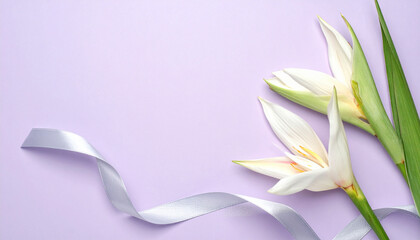 Elevate your design with this elegant image featuring white lilies and a silver ribbon on a soft purple background. Perfect for cards and decor. © Gravix