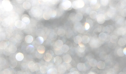 Fantasy holiday golden glow effect with glittering particles and soft shining festive light.