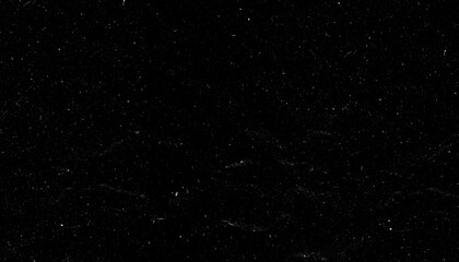 Image shows black background with white specks resembling noise or dust. It creates textured, abstract appearance