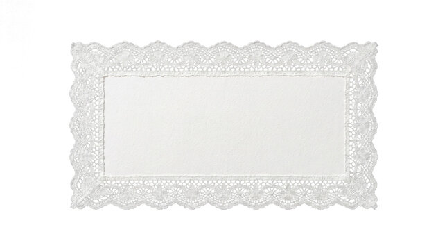 White lace paper doily with decorative scalloped edges and floral patterns
