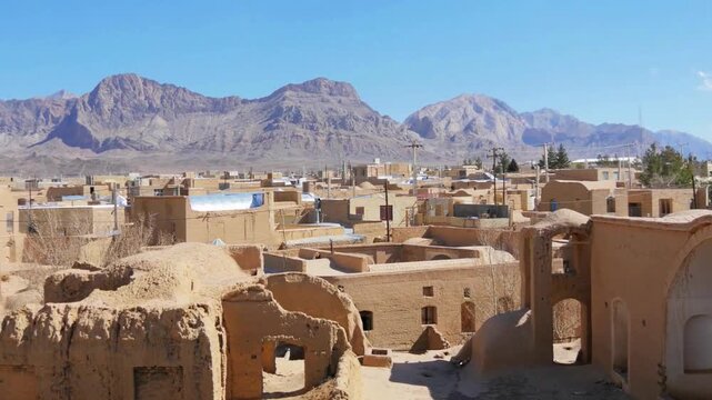 Panoramic view over the old city of Kharanaq, Yazd Province, Iran. Ancient Mud Brick Ghost Town of Kharanaq in Yazd