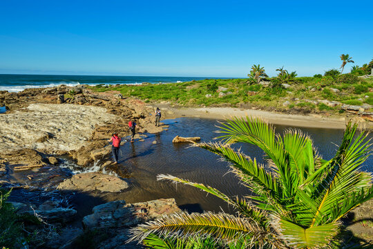 Hikers exploring scenic Wild Coast trail in South Africa outdoors