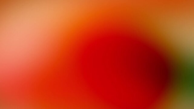 Vibrant orange and red fiery gradient background with smooth flowing modern loop motion. Perfect for video projects, background design or wallpaper