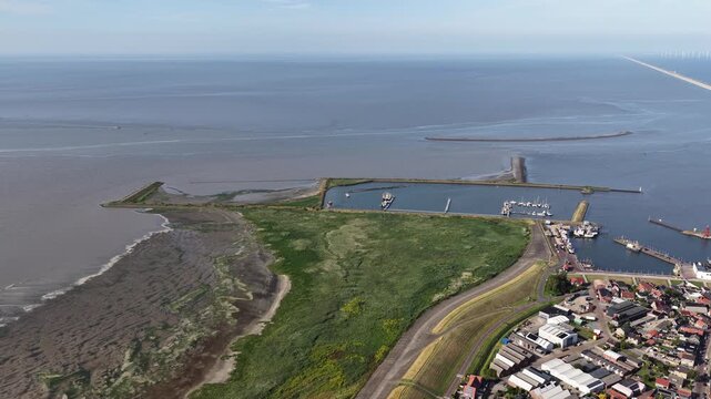 Aerial view of dutch harbor town and north sea coastline