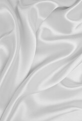 Obraz premium Smooth elegant white silk or satin luxury cloth texture as wedding background. Luxurious background design