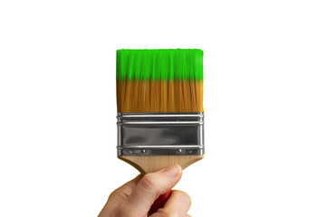 Vibrant Paintbrush with Green Paint on Yellow Background, a Hand Painting for Art and Creativity