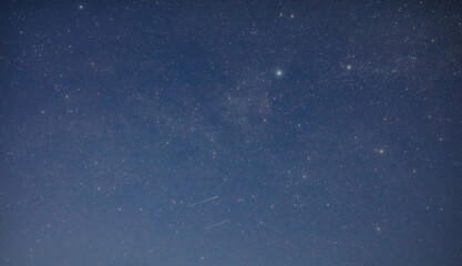 Fototapeta premium Milky way stars and constellations with a galaxy background.