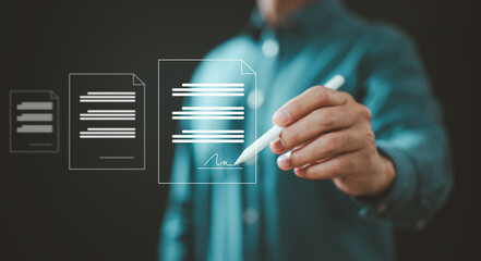 Businessman digitally signing electronic documents on transparent screen