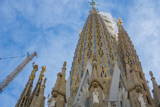 Basilica de la sagrada familia towers barcelona Spain antoni gaudi modernisme architecture historical cathedral ornate stone details religious landmark