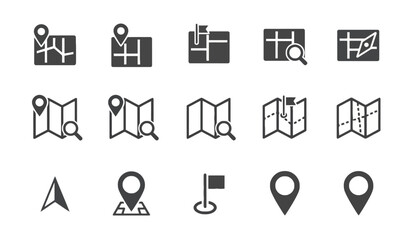 A collection of various map and location icons are displayed together on a surface.