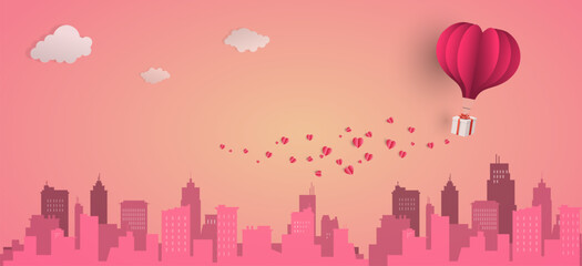 Heart balloon with gift box floating top the city, happy valentine's day banners, paper art style.