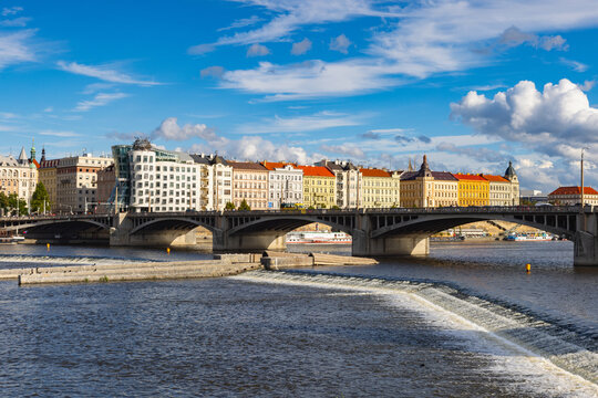 View from riverbank in Smichov on Dancing House in Prague, Czech