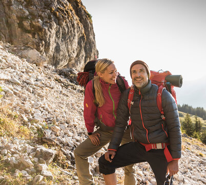 Hiking couple admiring beautiful nature
