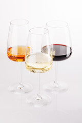 Obraz premium Different wine glasses on white background