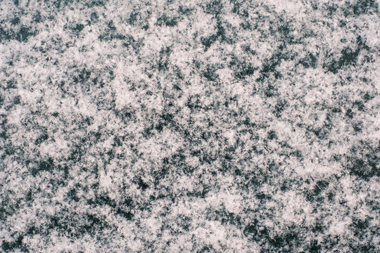 Macro View of Snowflakes Covering a Surface