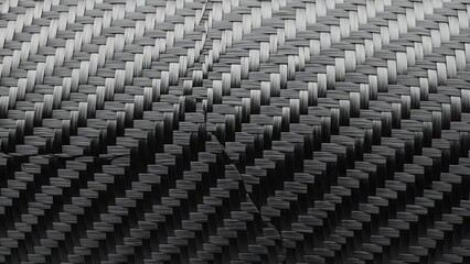 Detailed view of a carbon fiber twill weave texture