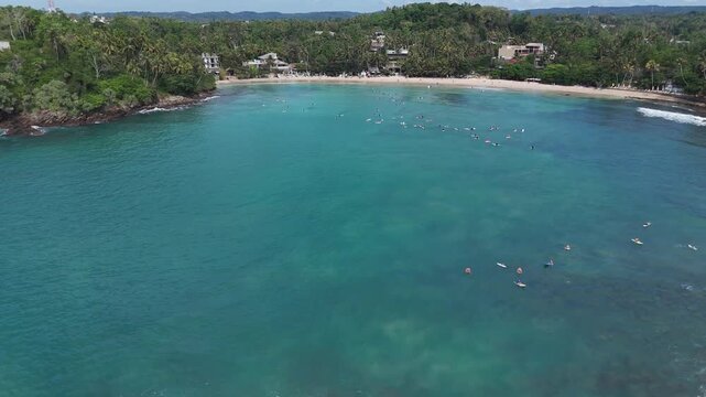 Scenic view of popular surf bay in Sri Lanka. Hiriketiya, Dikwella, 4K, 60fps, Drone, Top view