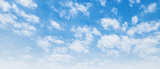 The sky is blue with  few clouds scattered throughout