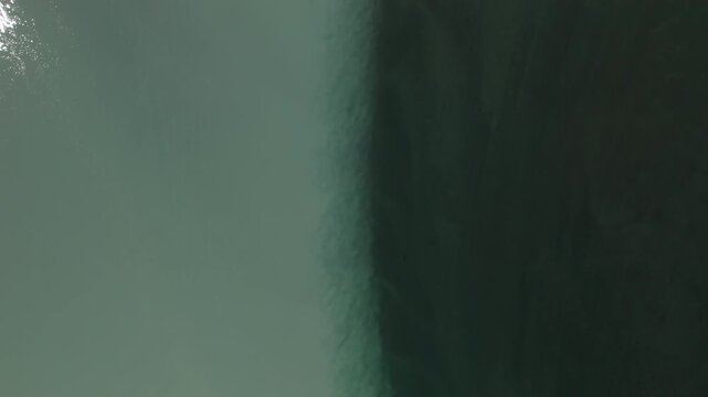 Milky colours of glacier meltwater meets fresh water river in Lom.