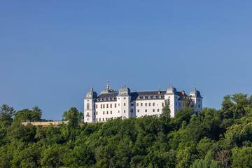 Fototapeta premium Halic Castle architecture standing on green hill in Slovakia