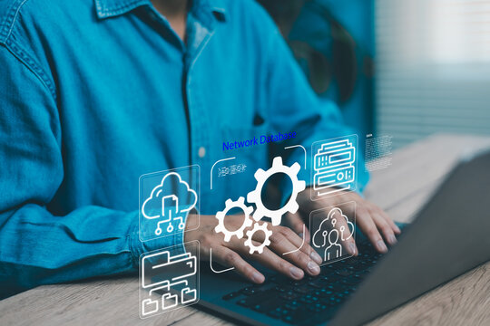 Cloud network database and IT automation concept,Man working on laptop with virtual system icons data management, server infrastructure, workflow cybersecurity digital transformation technology
