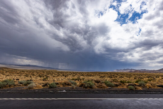 USA, Nevada, Winnemucca, Storm clouds over desert landscape