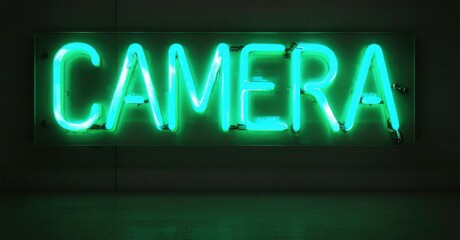 Obraz premium Bright green neon sign spells CAMERA against dark wall. Simple rectangular backdrop enhances glowing letters. Minimalist aesthetic.