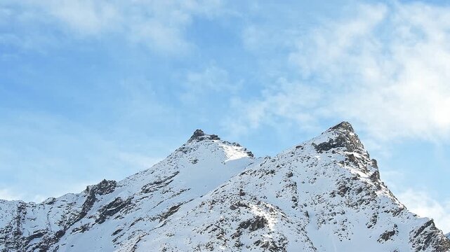 Moving clouds above mountain peak in the Gran Paradiso national park