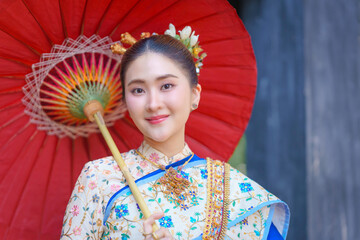 Elegant Asian Thai Woman in Traditional Lanna Fashion, Thai Culture, Traditional Thai Dress.