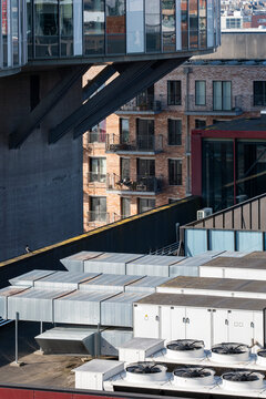 Industrial urban city architecture rooftop with ventilation equipment and infrastructure in Stockholm Sweden highlighting utilitarian technology