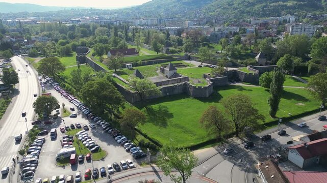 Ascending aerial video unveils a scenic view of a medieval fort in Banja Luka, Bosnia and Herzegovina.